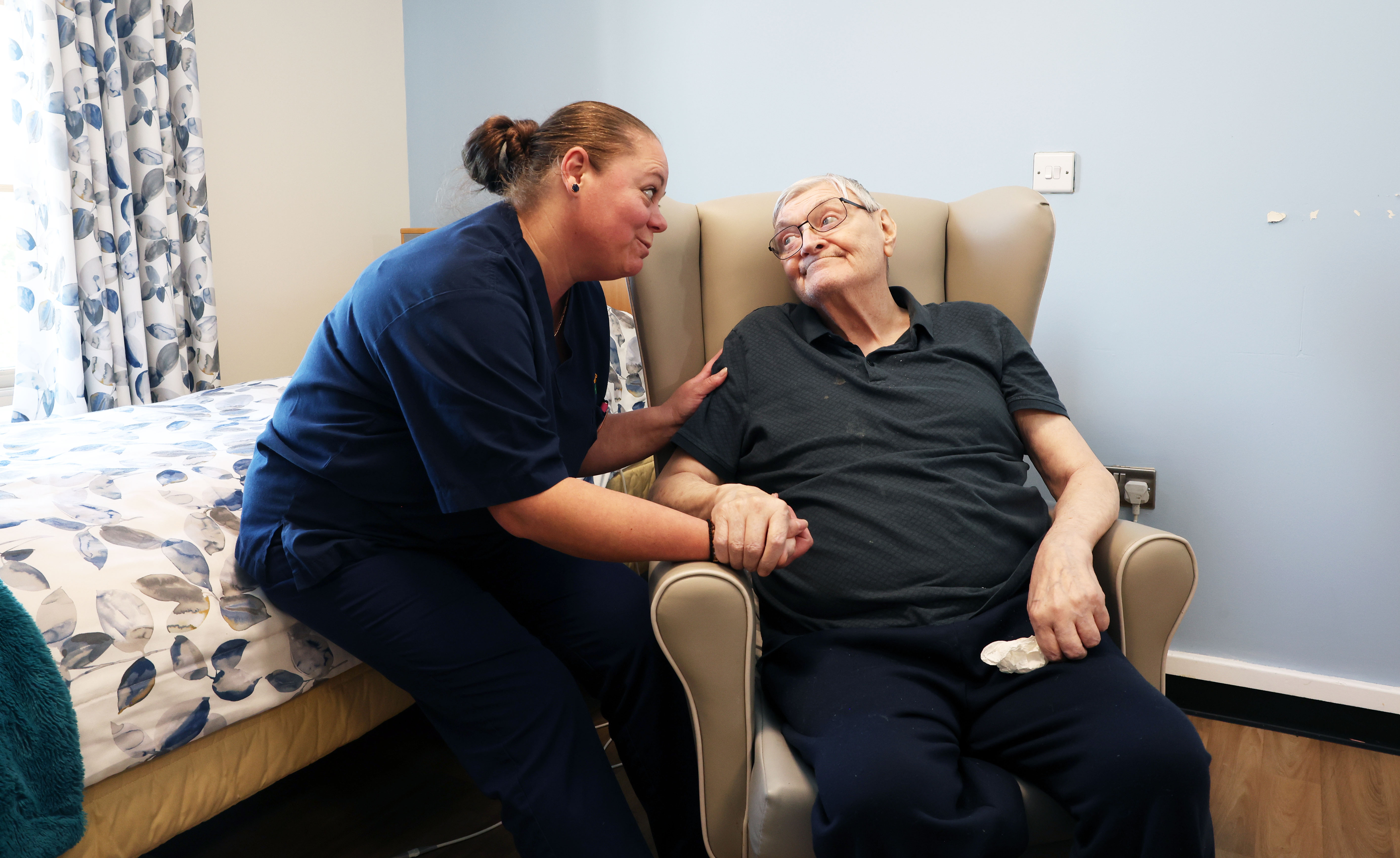 Brocastle resident with carer