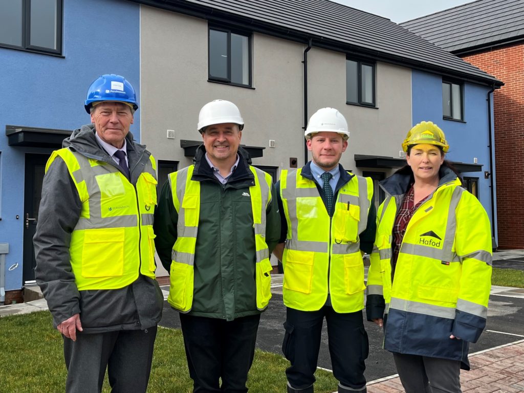 Colleagues outside new homes at our East Haven Barry Waterfront development.