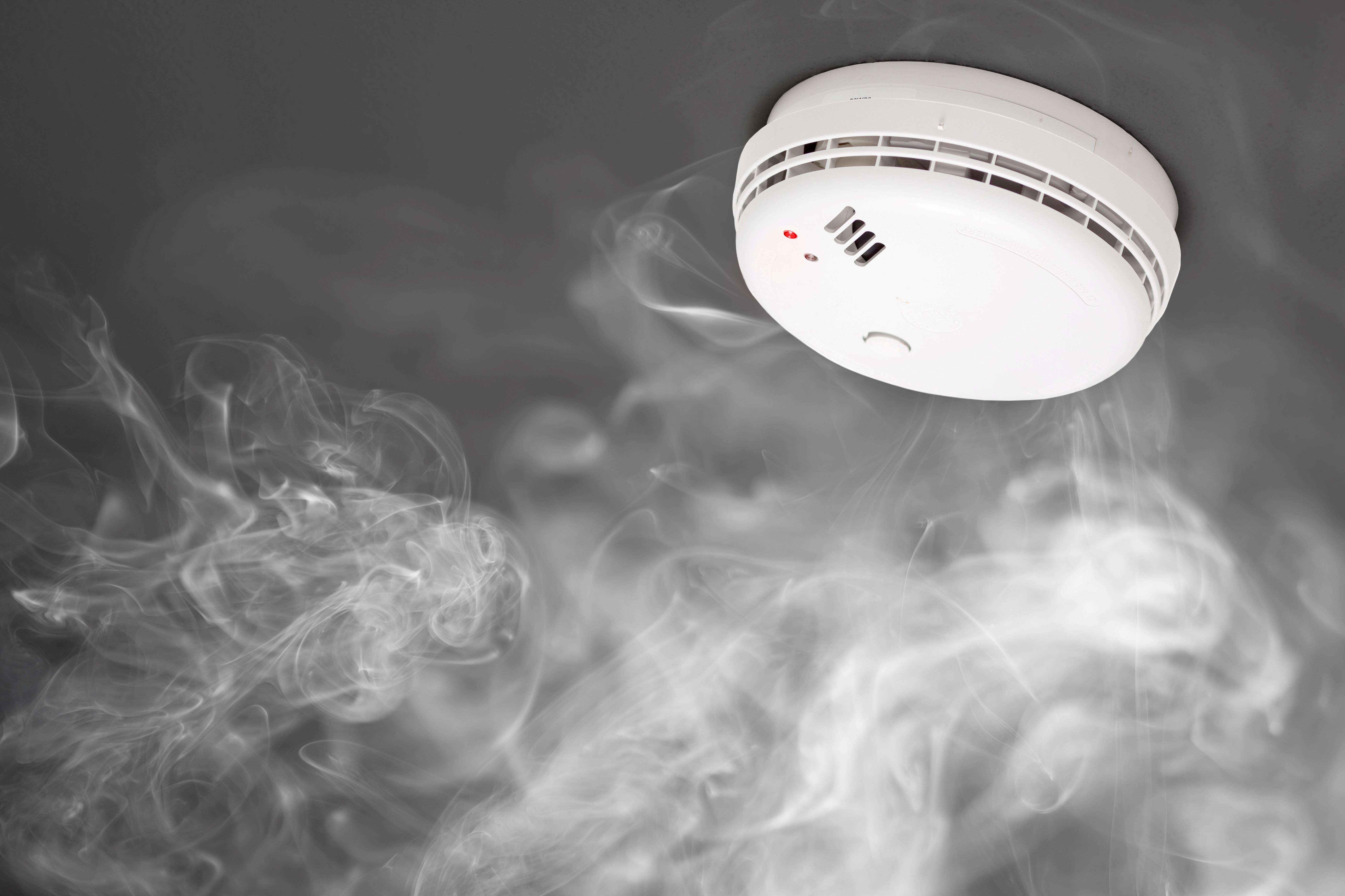 Smoke floating up to fire alarm