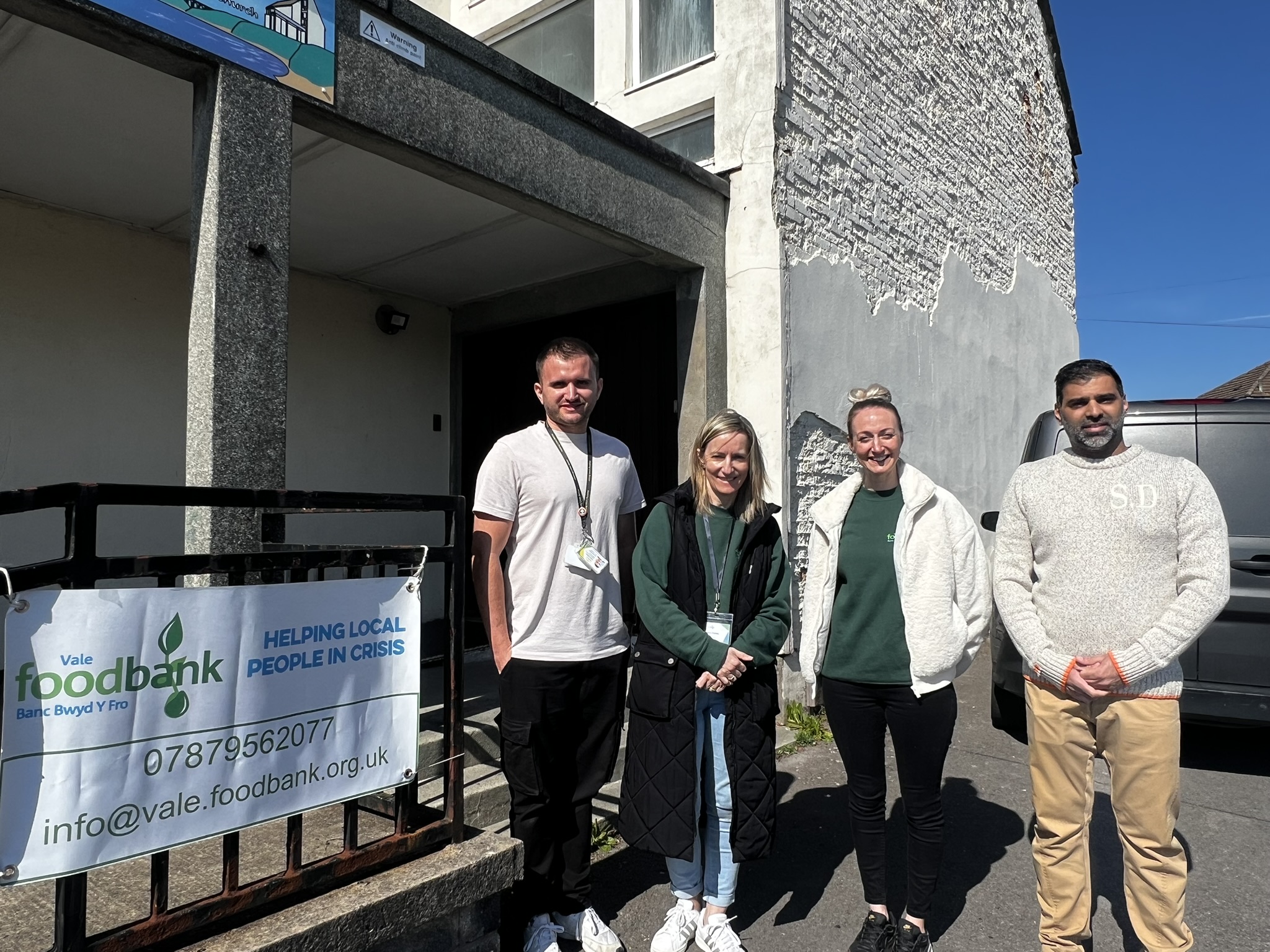 Four people, from Hafod, Encon and the Vale Foodbank