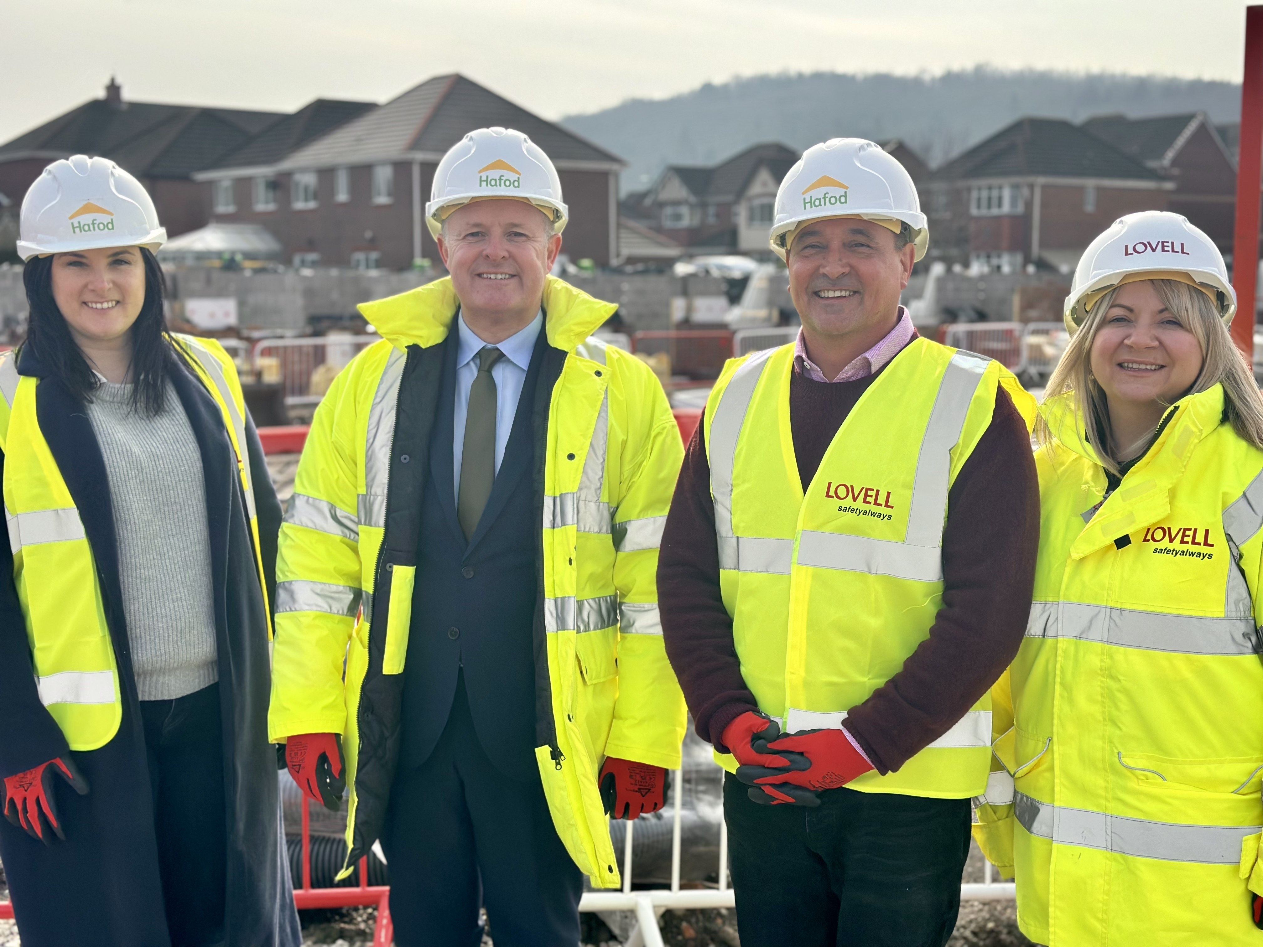 People in hi vis vests at a building site