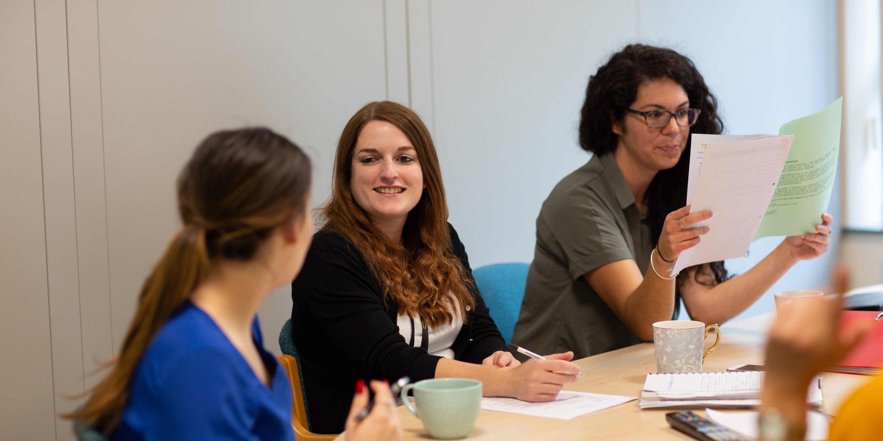 Hafod colleagues chatting in a meeting