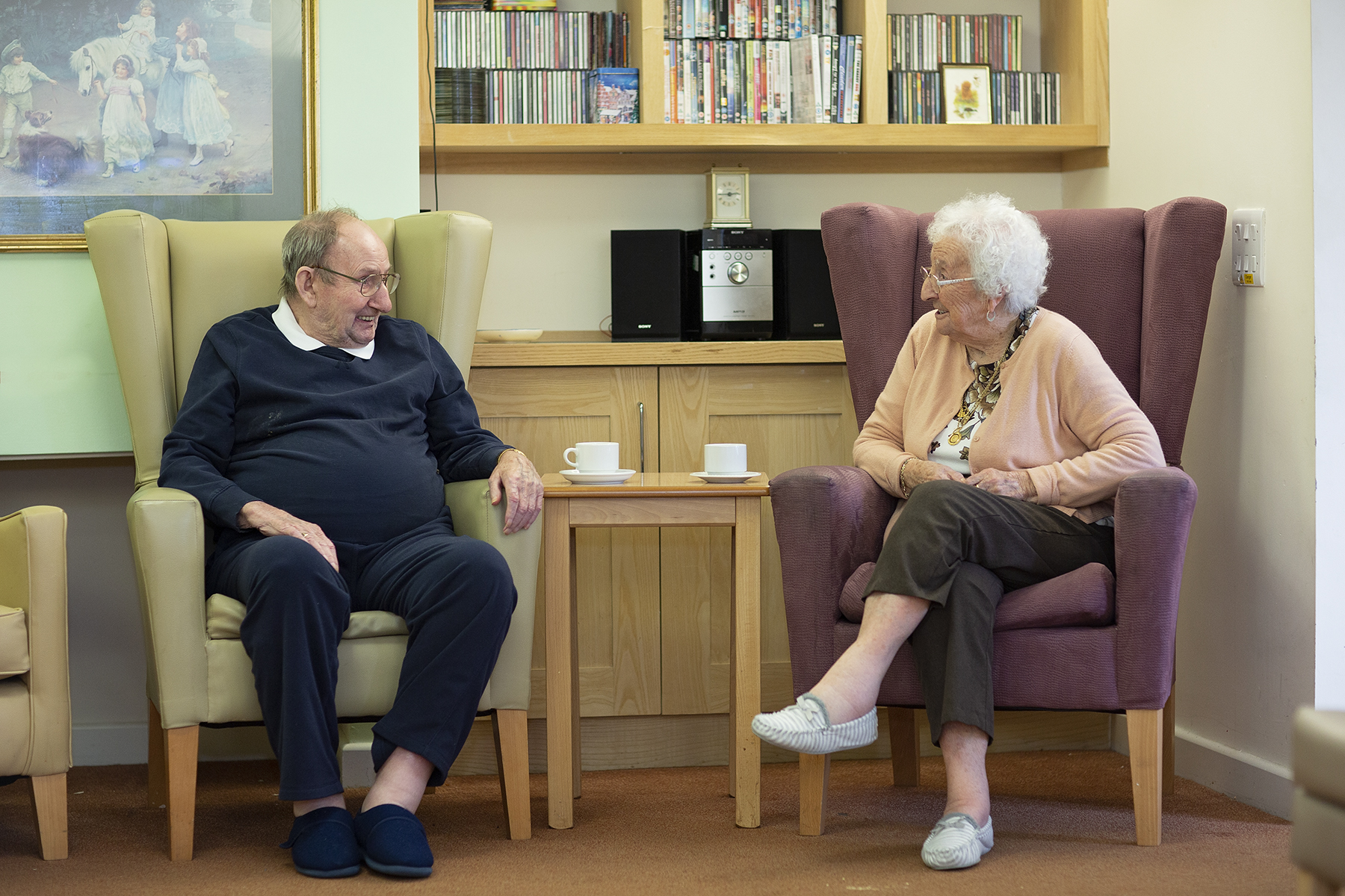 Residents having a cup of tea together at Woodcroft Care Home