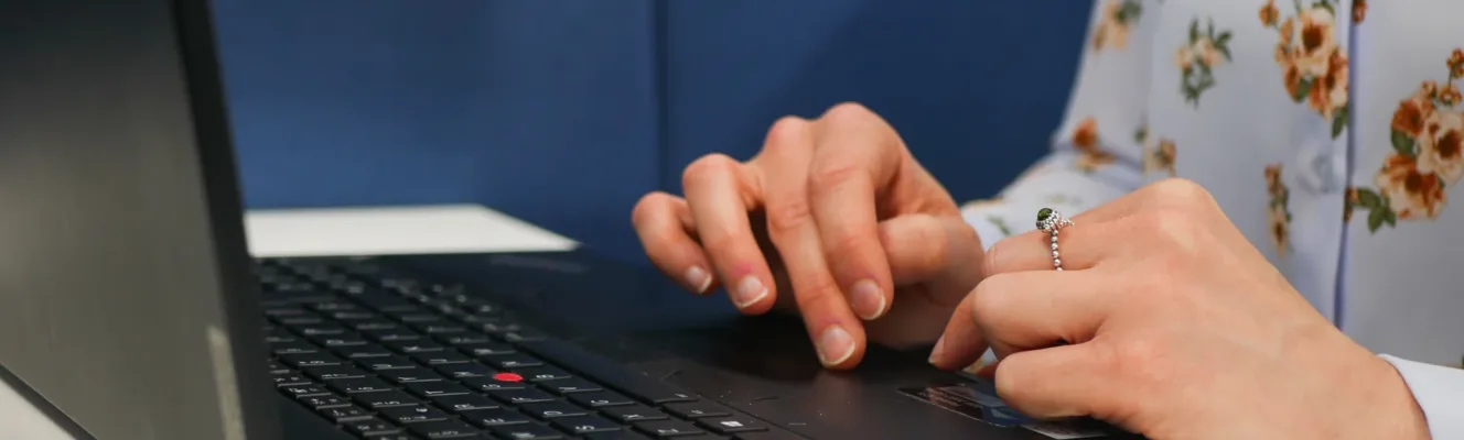 Hafod Housing Association a close up of hands on a laptop