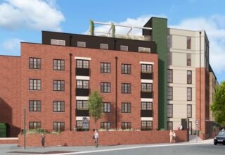 CGI image of red brick apartment block