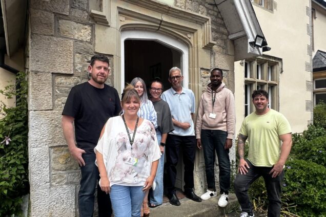 Hafod Housing Association Bridgend Hub team standing infront of a building