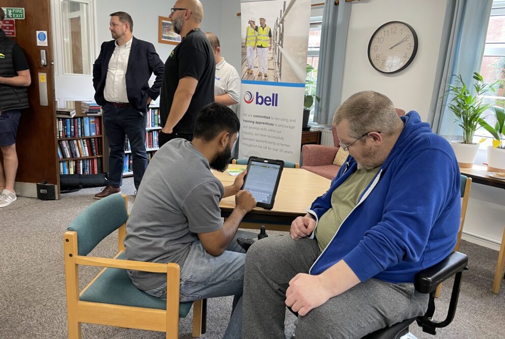 Hafod Housing Association footprint decarbonisation community engagement day customers and colleagues getting help with decarbonisation apps