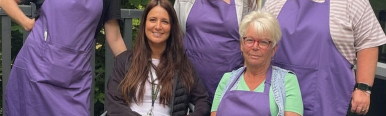 Fir Tree Food Pantry volunteers sitting outside the centre