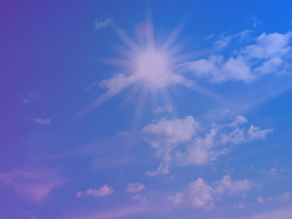 Sun shining in blue sky with some clouds